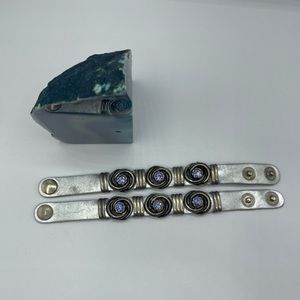 Leather cuff bracelets made of genuine leather with purple and silver details